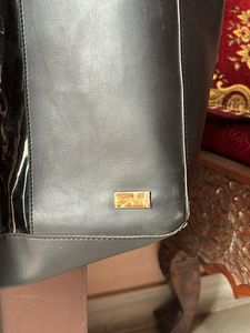 Yelloe Black Handbag