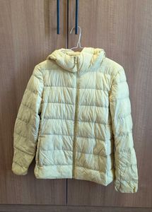 Uniqlo ultra light down jacket in butter yellow