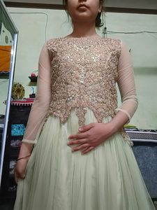 Heavy Embroidered Net Party Wear Long Gown With Du