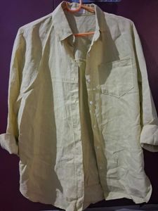 Yellow button up shirt