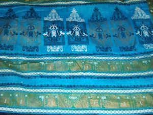 Womens Blue Cotton Saree With Golden Bady.
