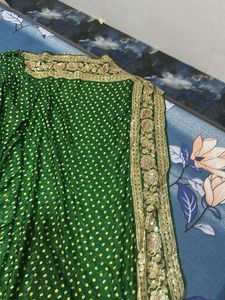 Elegant Green bandhej saree
