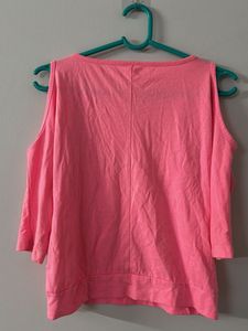 Bright pink sequence embellished cold shoulder top