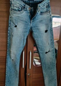 Distressed Blue Denim Jeans