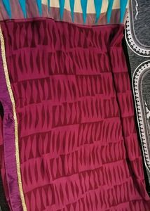 Saree In Multi Colour With Golden Lace.