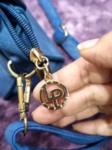 AUTHENTIC LINO PERROS SLING BAG