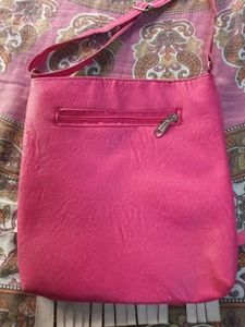 Pink Faux Suede Fringe Crossbody Bag