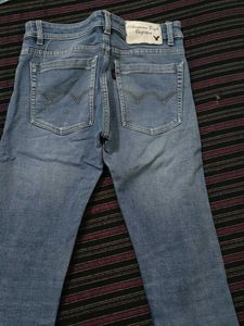 Distressed Denim Jeans
