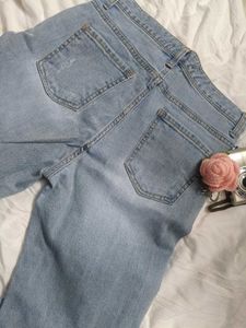 Ripped Light Wash Denim Jeans