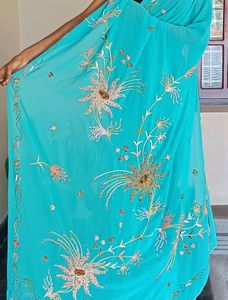 Teal Blue Colour Saree With Heavy Work Pallu.