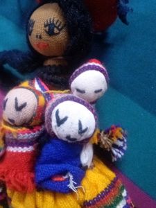 Handmade Doll Holding 3 Babies