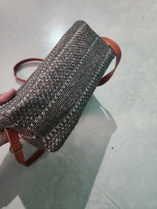 Woven jute sling bag
