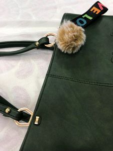 A Very Stylish Dark Green Handbag