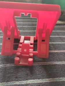 Red Plastic Phone Stand