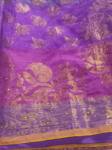 Elegant Purple zari and  stone work saree