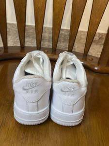 Nike Air Force 1 - Classic White Sneakers