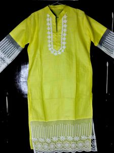 Yellow Colour Kurti With Net Work On It..