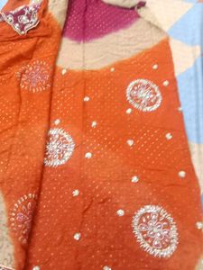 Orange embroidered saree