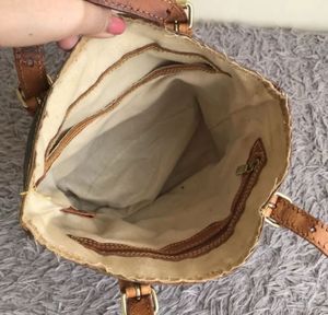 Authentic Louis Vuitton Monogram Petit Bucket Bag