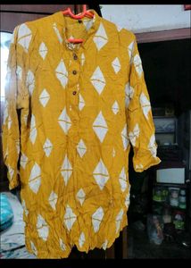 Yellow Printed Top and Black Pant.
