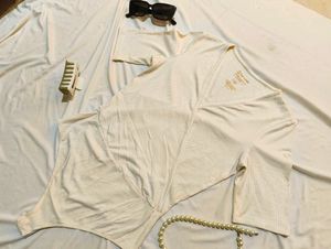 The Zoey Bodysuit (Oat Milk Color)