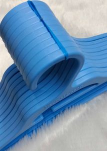 10 Blue Plastic Hangers
