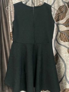 Sleeveless Peplum Top
