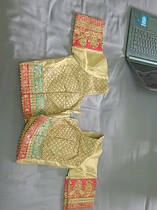 EMBELLISHED SILK LEHENGA IN PINK GREEN AND GOLDEN