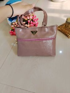 3. Pinkish Beige Handbag