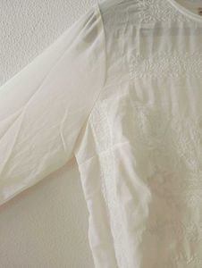 Elegant White Embroidered Blouse