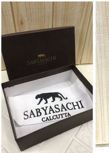 Sabyasachi Maroon Clutch
