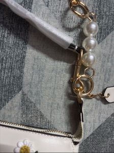 Coach Pearl Sling Bag
