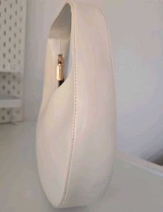 CHARLES &amp; KEITH Cream Philomena Half-Moon Bag