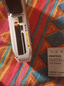 Pentax D-BC8 Camera With Penta Battery.