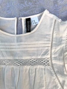 Brand new H&amp;M white Ruffled Sleeveless Top
