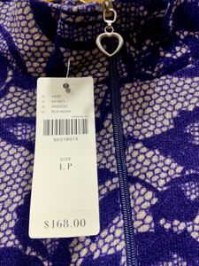 Imported Brand New Purple Floral Quarter Zip Top