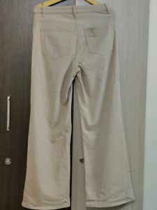 Beige Distressed Wide Leg Jeans
