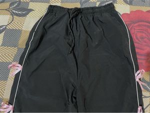 Trendy Black Track Pants with Pink Ribbon