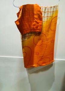 Orange sari with stitched blouse