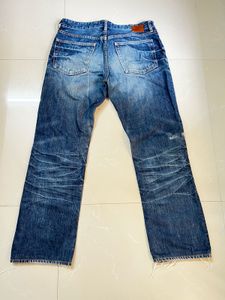 Ripped Straight Leg Jeans
