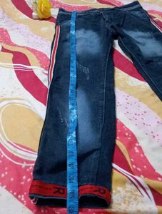 Stylish Jeans with Red Stripe