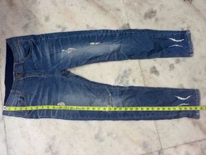 Distressed Blue Jeans