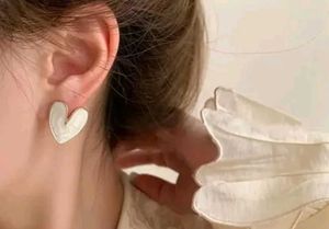 women white heart earrings