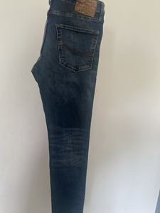 Distressed Denim Jeans
