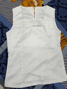 White Sleeveless Top