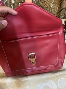 Woman’s Cherry Colored Bag