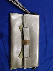Metallic Bow Clutch