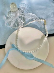 Bow Pearl Choker