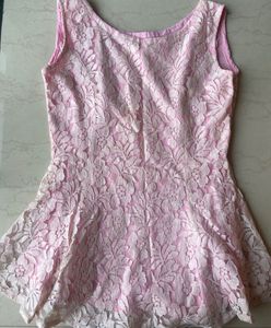 Lace peplum coquette top