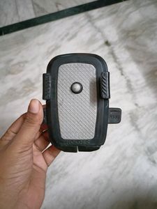 Mobile Holder With Flaw